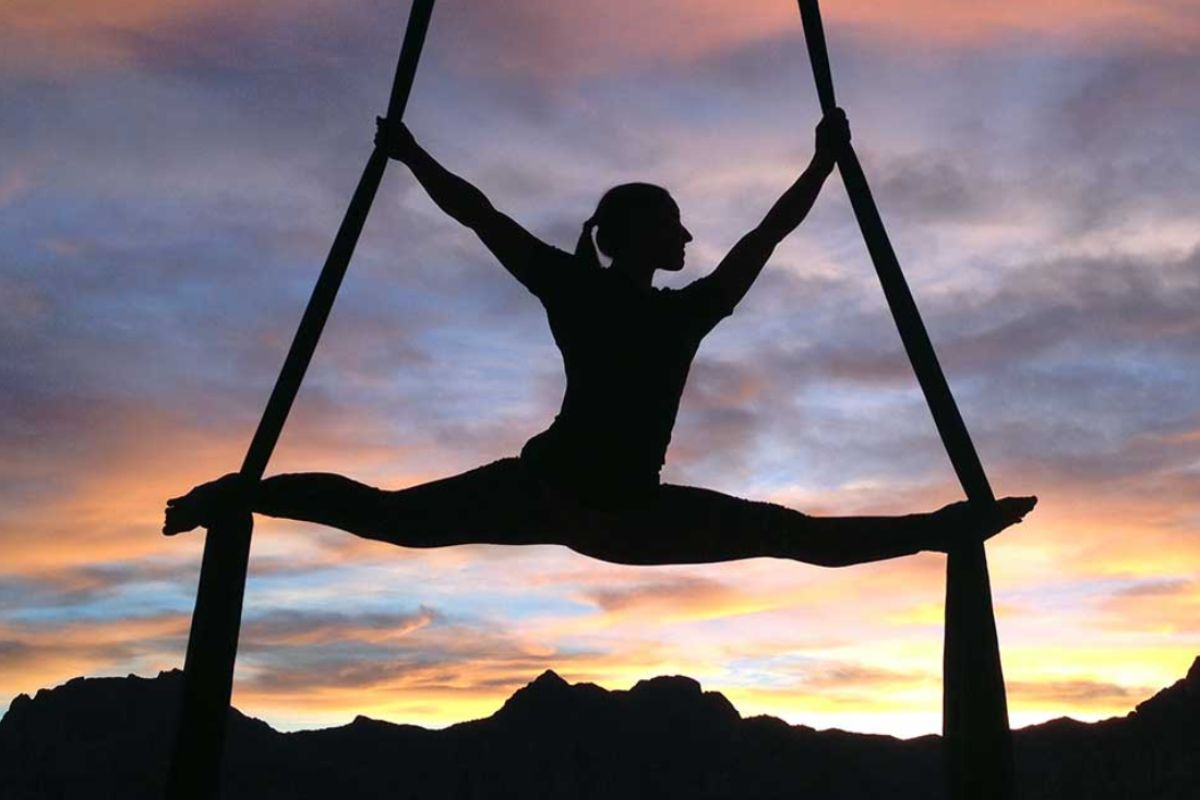 Beachfront aerial yoga retreat
