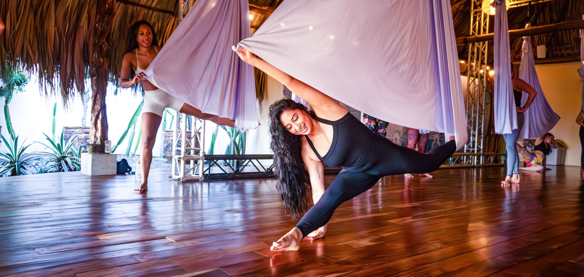 AerialStretch_1900x900 Aerial yoga in oceanfront Shala