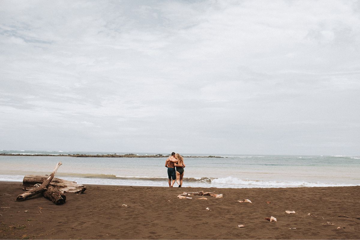 Couple embracing on beach