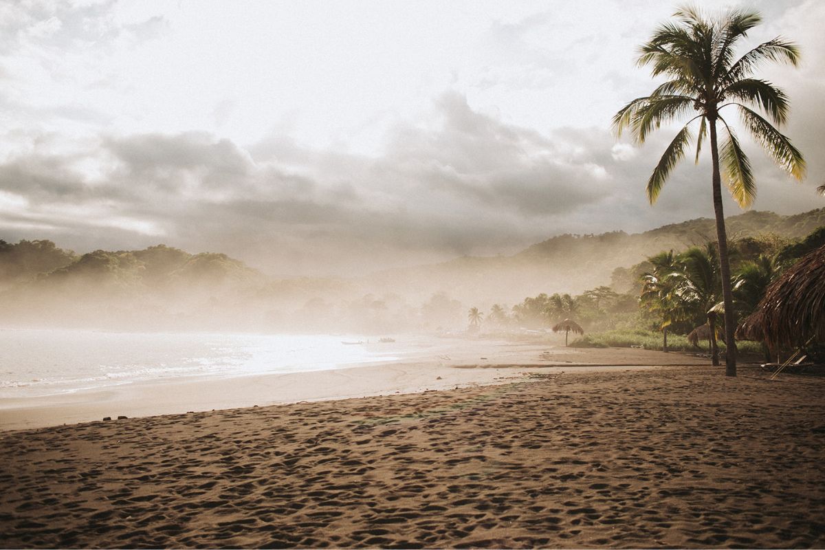 Romantic secluded black sand beach